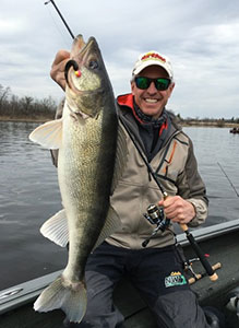 Chip Leer with River Walleye