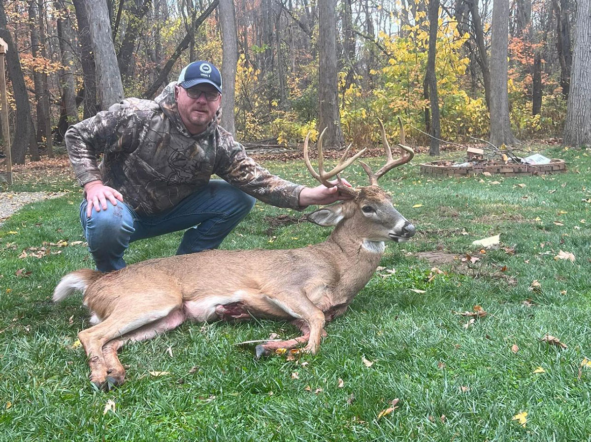 Shawn McDougal of Mishawaka with his crossbow 9-point