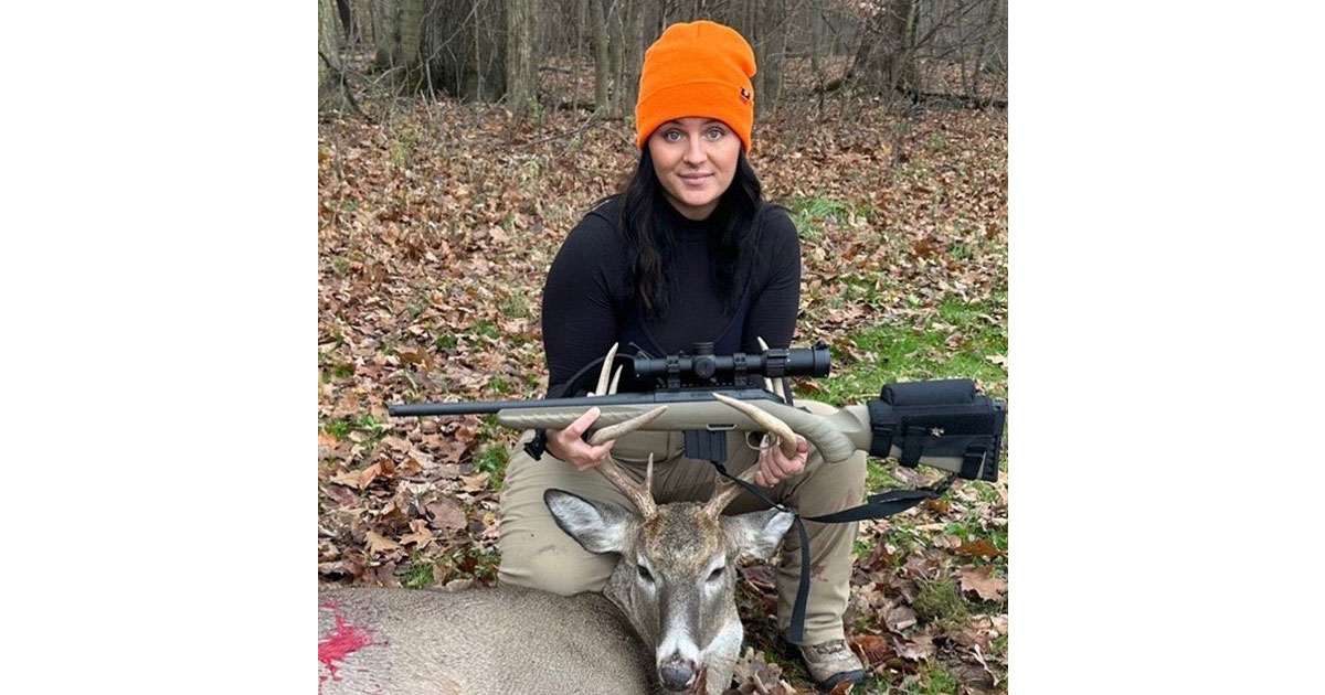 Elizabeth Marker with her 8-point buck