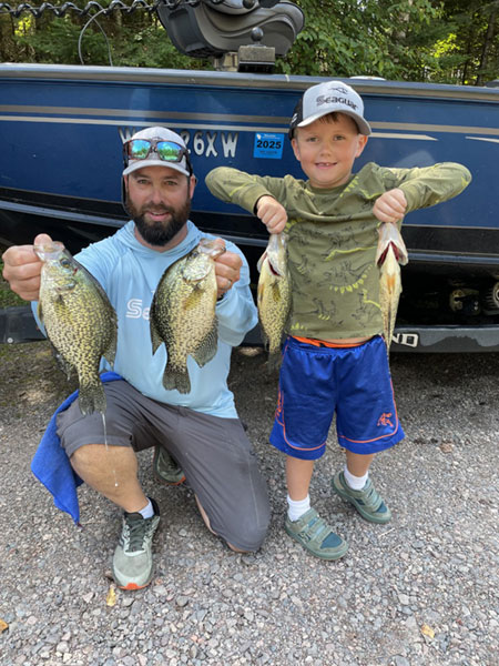 Rob and Arlo with crappies