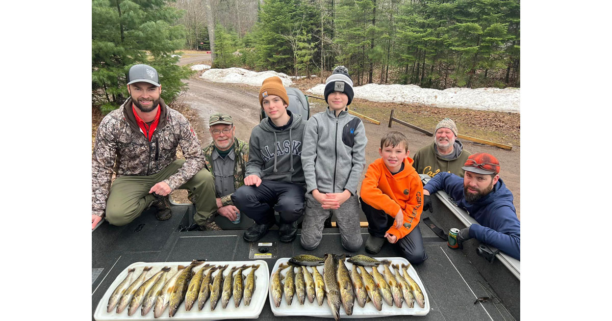 Rob Friedley with a group of kids