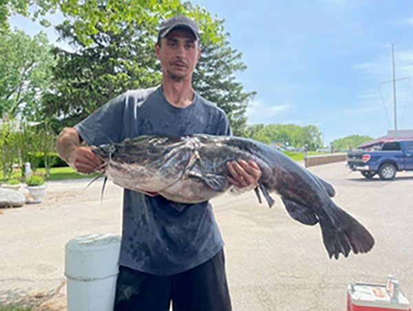 Lloyd Tanner with Michigan state-record flathead catfish