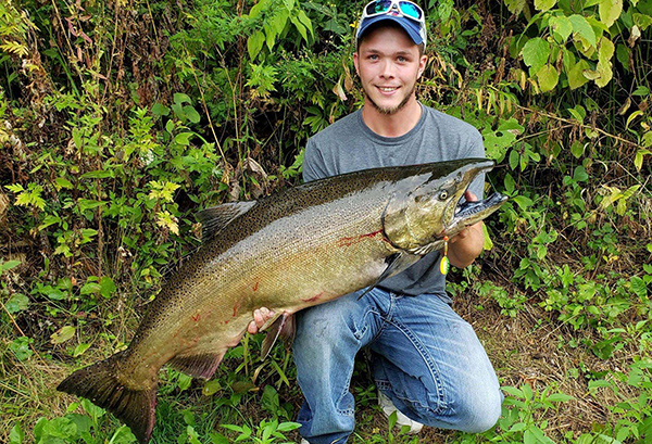 How big are the king salmon getting? Well, Danny Lunn of Portage, Ind. caught this 32.68-pound king from Salt Creek earlier this month. The fish was 42 inches long and had a 25 1/2-inch girth. He caught it on his own fire-tiger Custom Creek Spinner, 8-pound line and on a 9 1/2-foot rod. (Photo provided)