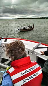 The Canadian Coast Guard tows Buss boat to Pelee Island where he sheltered for the night.