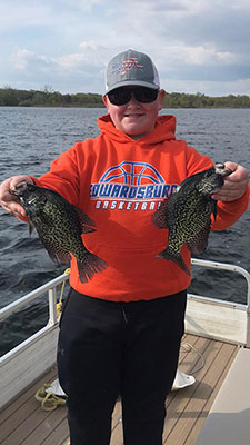 Young fisherman with nice crappies