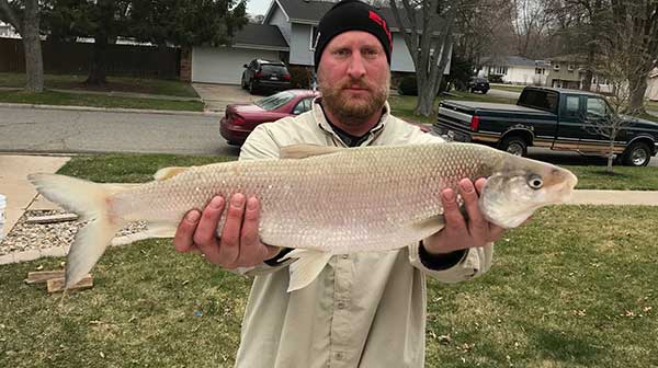 Dustin Meeter with State Record Whitefish
