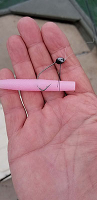 Three-inch pink TRD soft plastic on a 1/16th jig head.