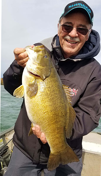 Louie with personal best smallmouth
